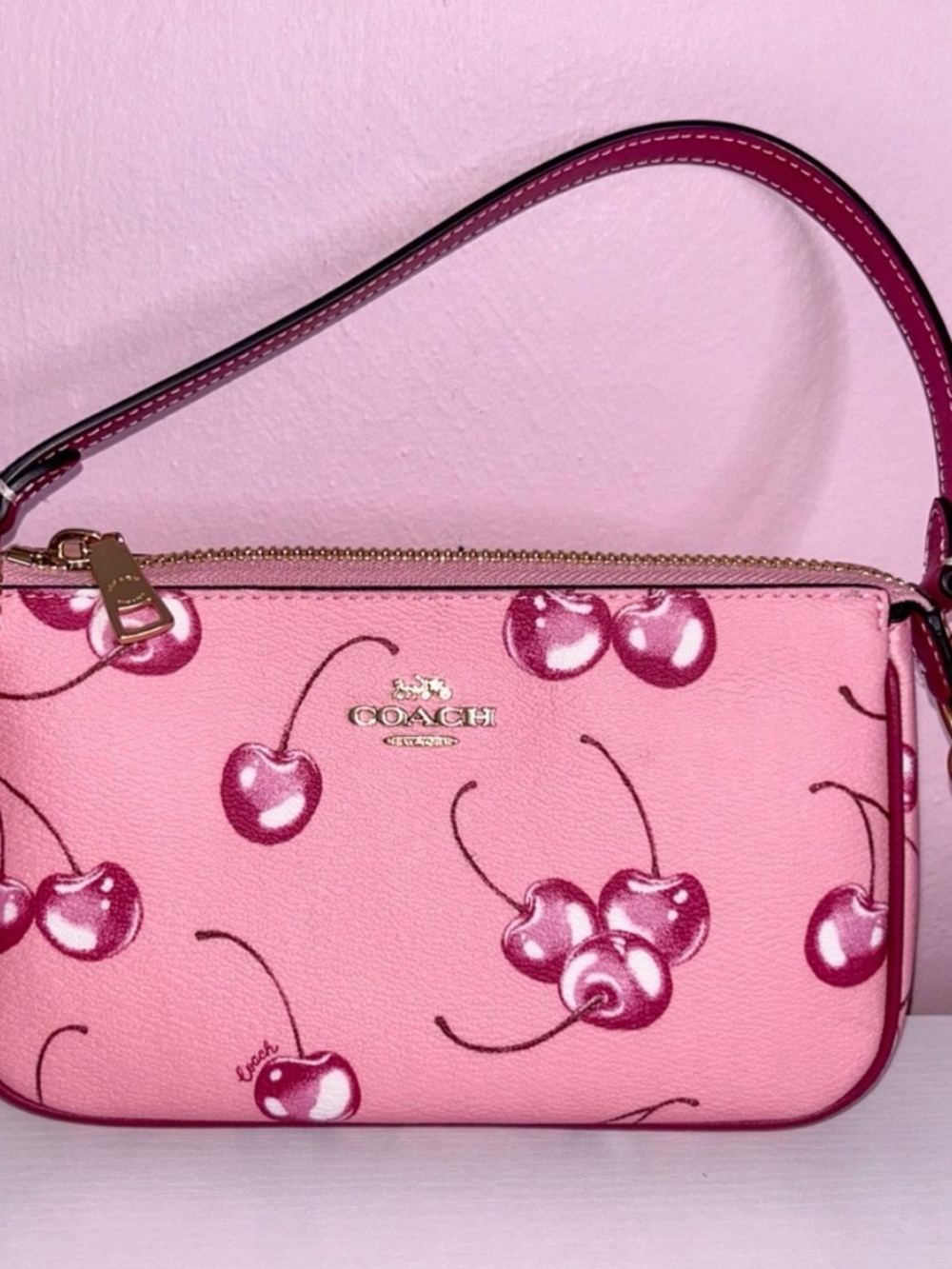 Coach CR827 Nolita 19 Small Shoulder
Bag With Cherry Print.